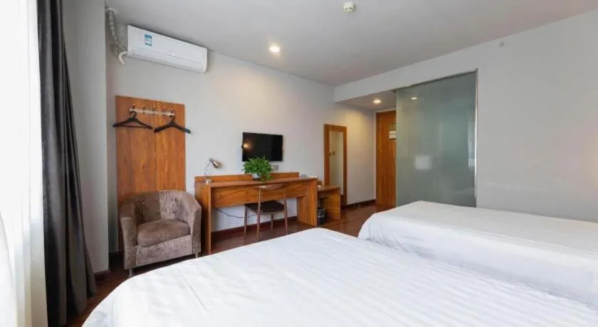 Bed in Jinjiang Inn Style Tianjin Wuqing Traditional Chinese Medical Hospital