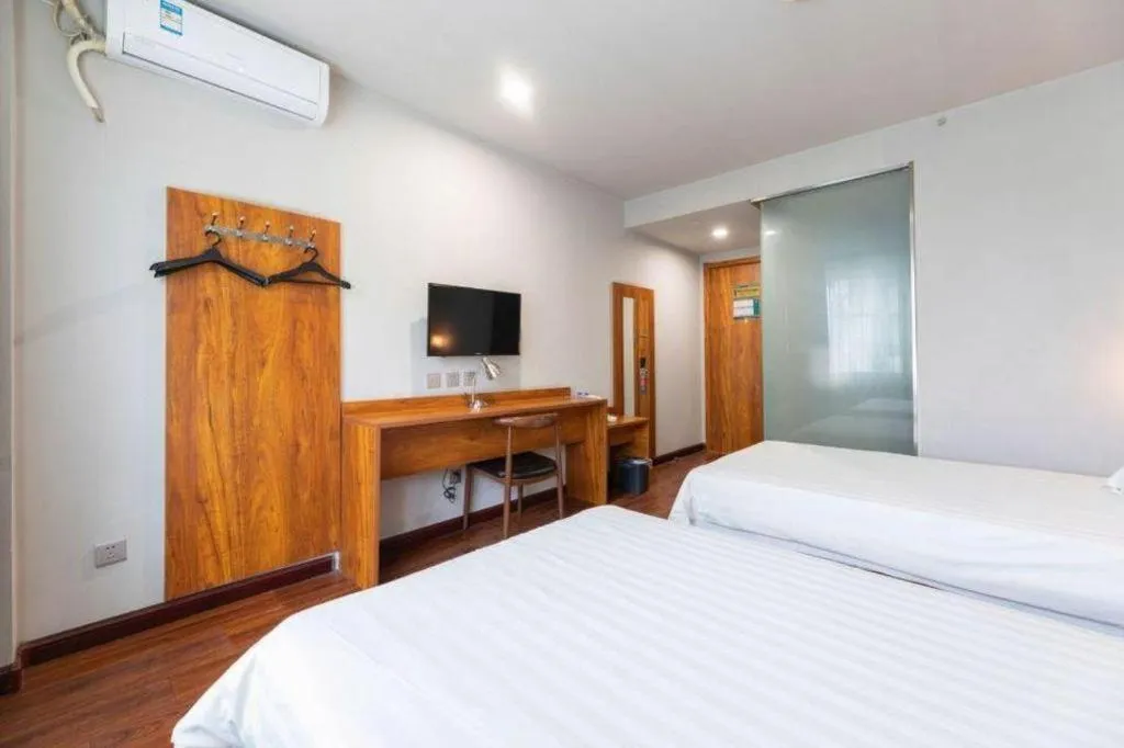 Bed in Jinjiang Inn Style Tianjin Wuqing Traditional Chinese Medical Hospital