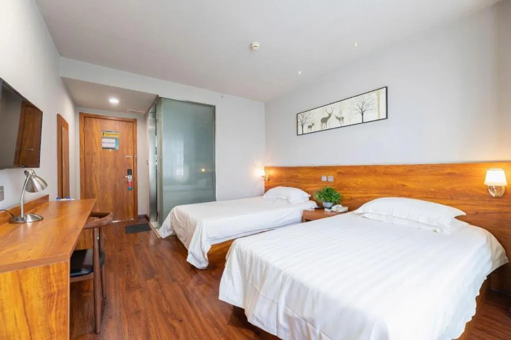 Bed in Jinjiang Inn Style Tianjin Wuqing Traditional Chinese Medical Hospital