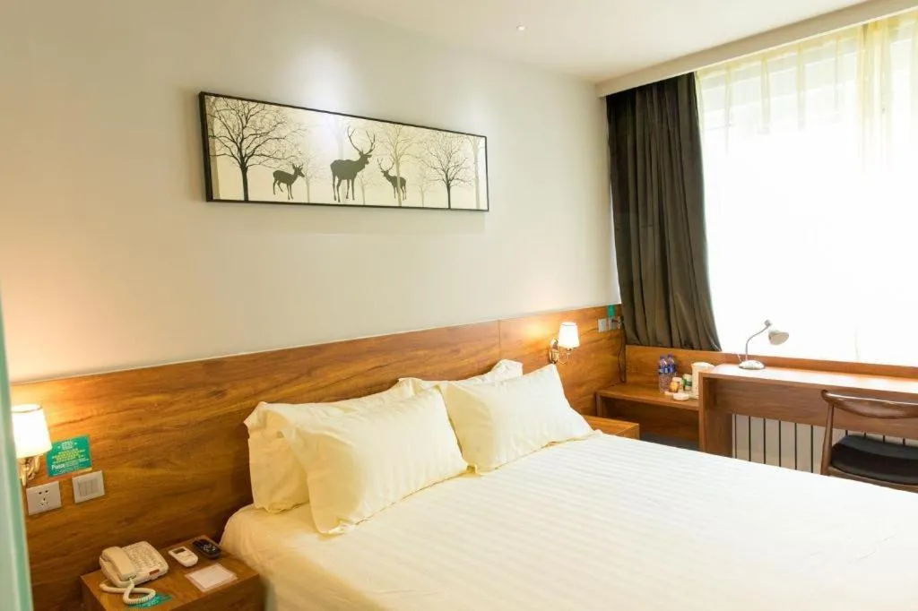 Bed in Jinjiang Inn Style Tianjin Wuqing Traditional Chinese Medical Hospital