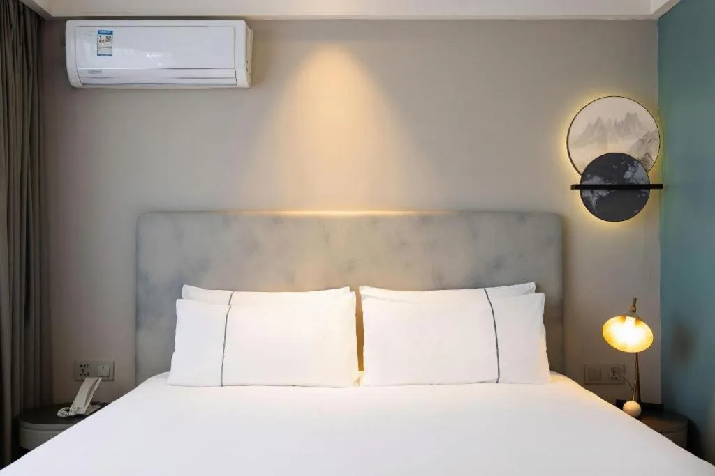 Bed in Magnotel Harbin Medical University First Affiliated Hospital