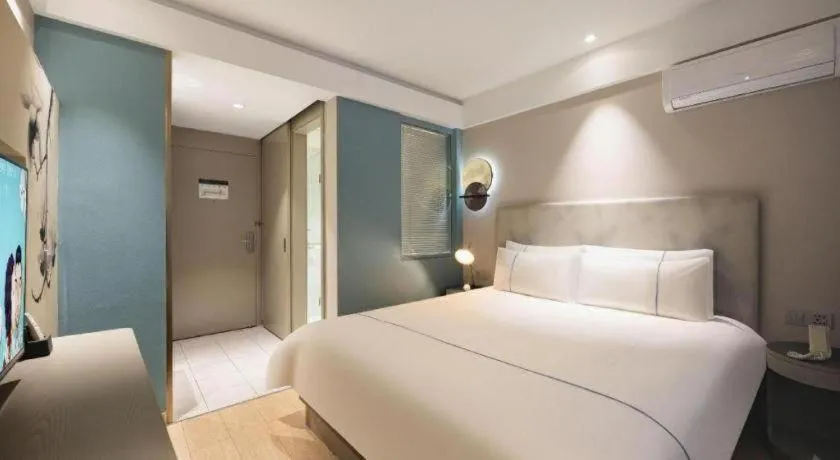 Bed in Magnotel Harbin Medical University First Affiliated Hospital