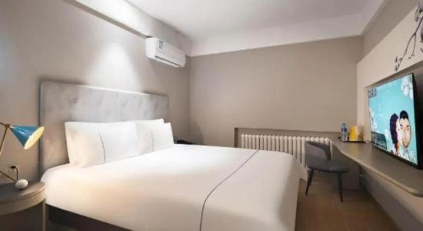 Bed in Magnotel Harbin Medical University First Affiliated Hospital