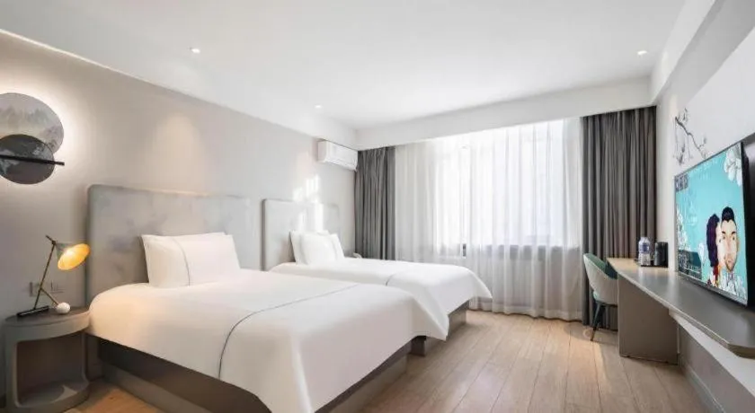 Bed in Magnotel Harbin Medical University First Affiliated Hospital