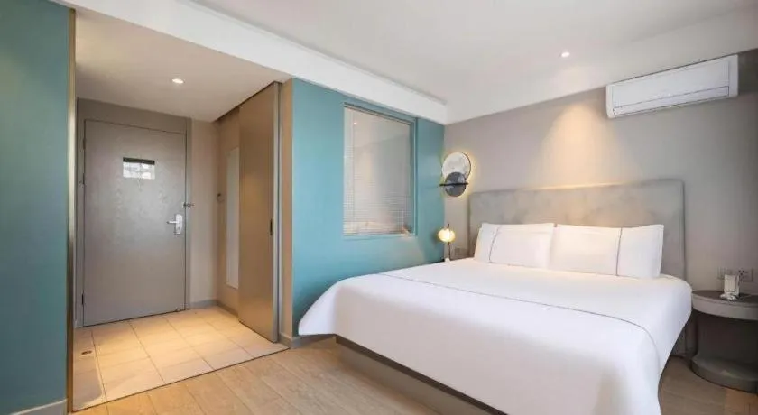 Bed in Magnotel Harbin Medical University First Affiliated Hospital