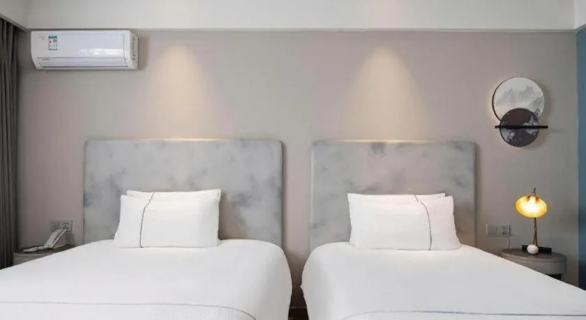 Bed in Magnotel Harbin Medical University First Affiliated Hospital