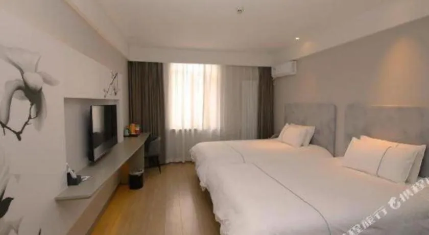 Bed in Magnotel Harbin Medical University First Affiliated Hospital