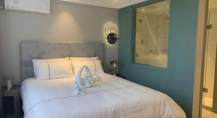 Bed in Magnotel Harbin Medical University First Affiliated Hospital