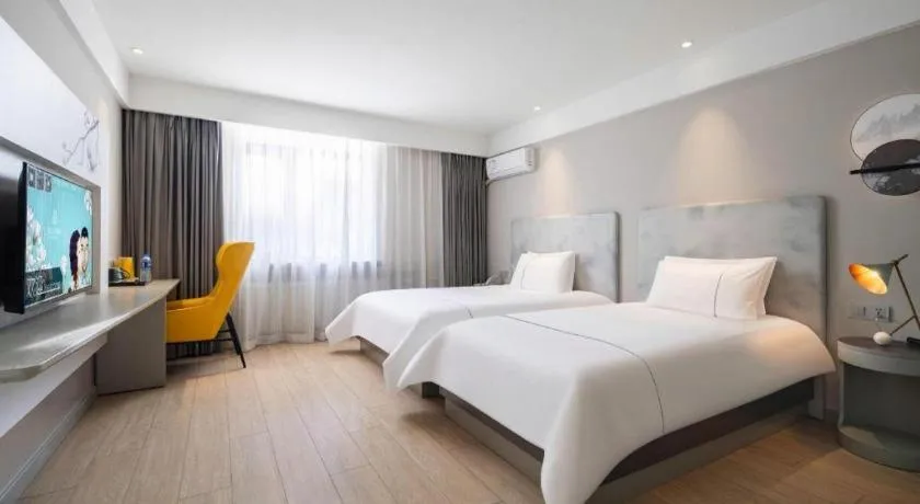 Bed in Magnotel Harbin Medical University First Affiliated Hospital