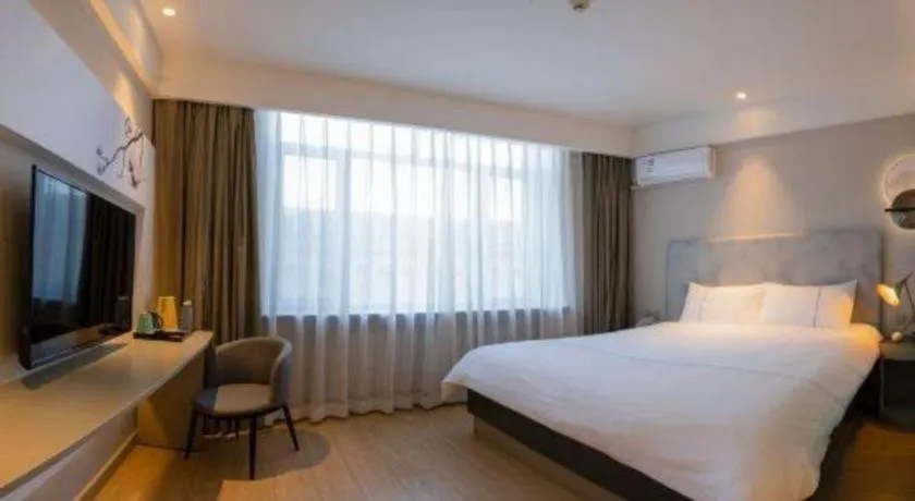 Bed in Magnotel Harbin Medical University First Affiliated Hospital