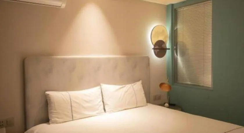 Bed in Magnotel Harbin Medical University First Affiliated Hospital