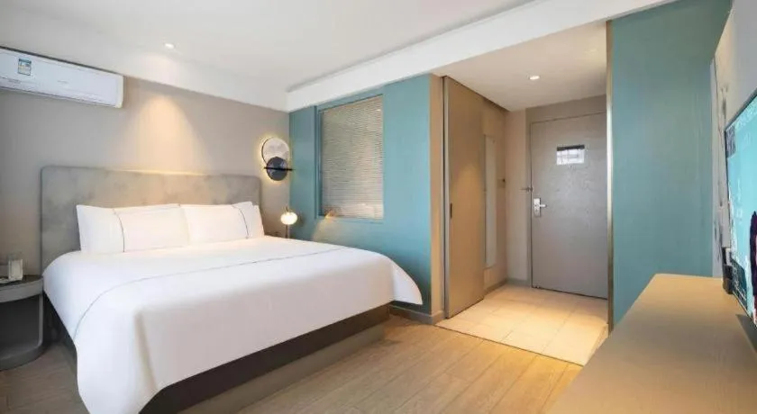 Bed in Magnotel Harbin Medical University First Affiliated Hospital