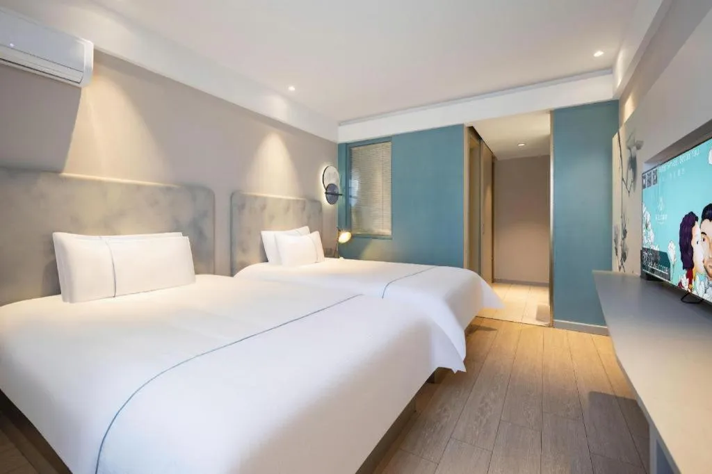 Bed in Magnotel Harbin Medical University First Affiliated Hospital