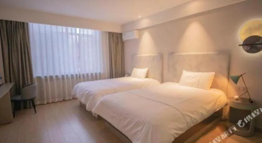 Bed in Magnotel Harbin Medical University First Affiliated Hospital