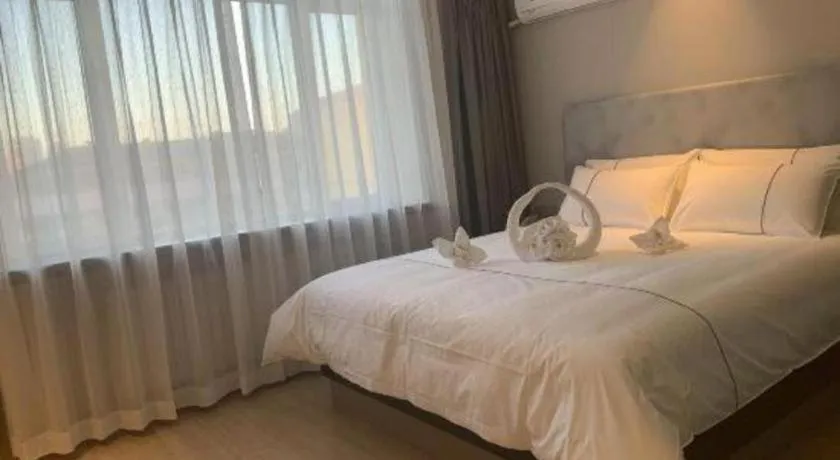 Bed in Magnotel Harbin Medical University First Affiliated Hospital