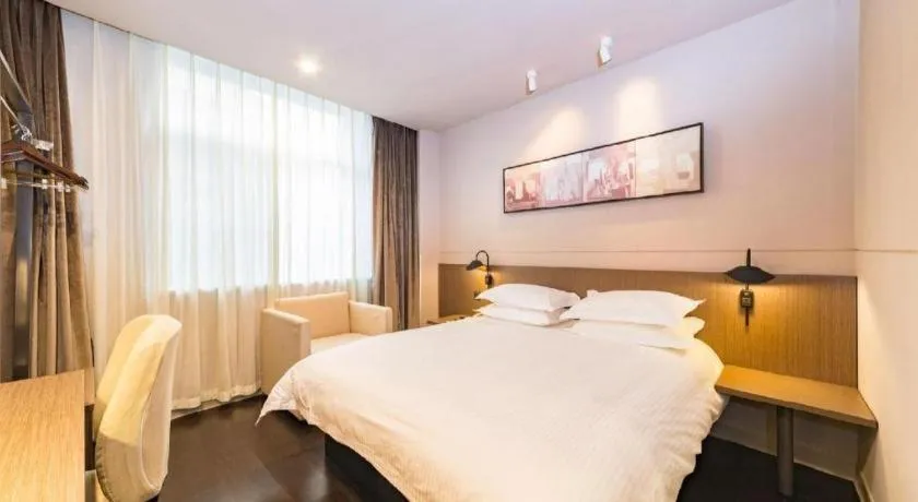 Bed in Jinjiang Inn Select Yancheng Oufeng Hua Street Julong Lake