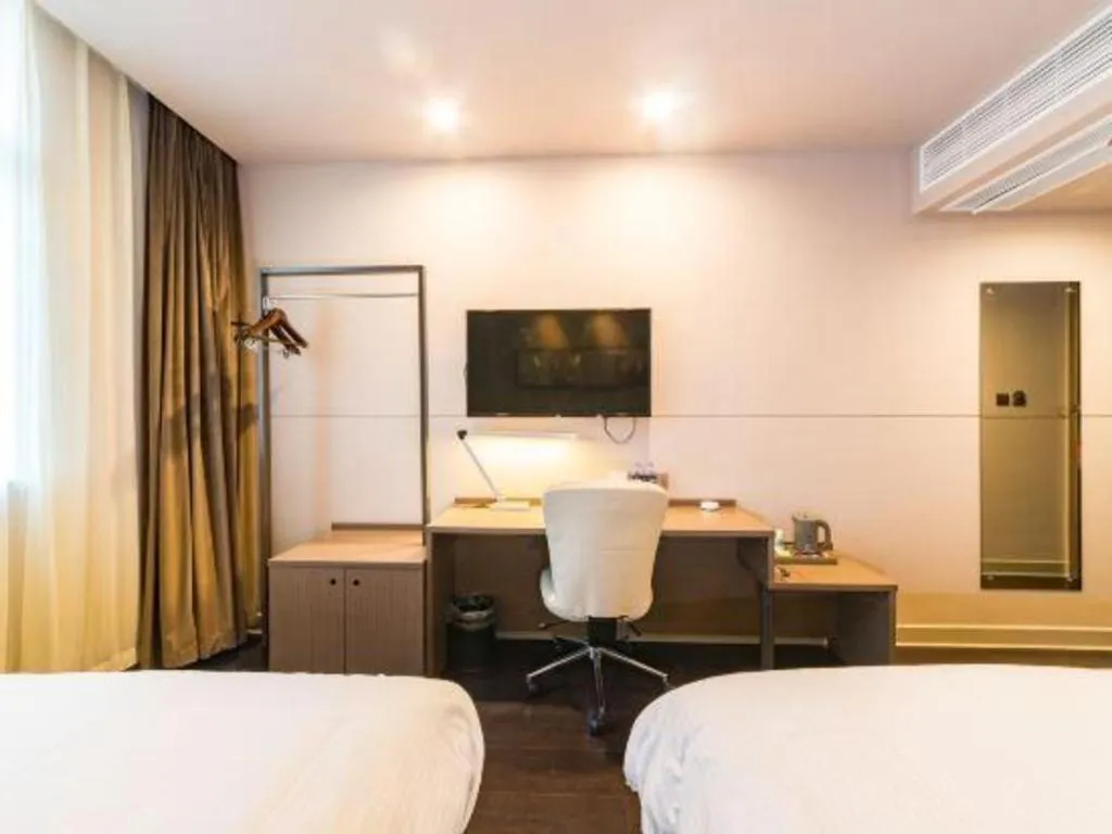 Bed in Jinjiang Inn Select Yancheng Oufeng Hua Street Julong Lake