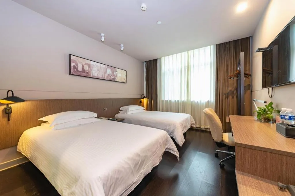 Bed in Jinjiang Inn Select Yancheng Oufeng Hua Street Julong Lake