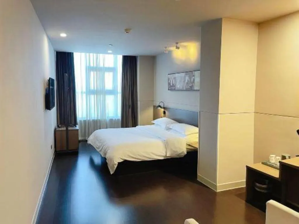 Bed in Jinjiang Inn Select Yancheng Oufeng Hua Street Julong Lake