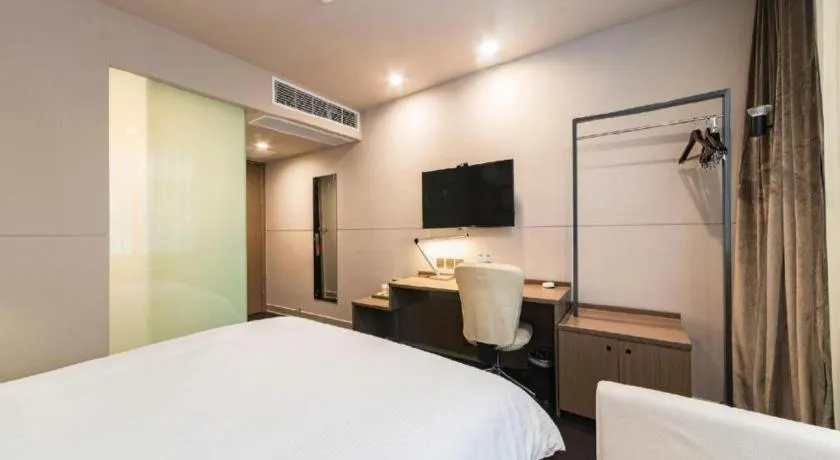 Bed in Jinjiang Inn Select Yancheng Oufeng Hua Street Julong Lake