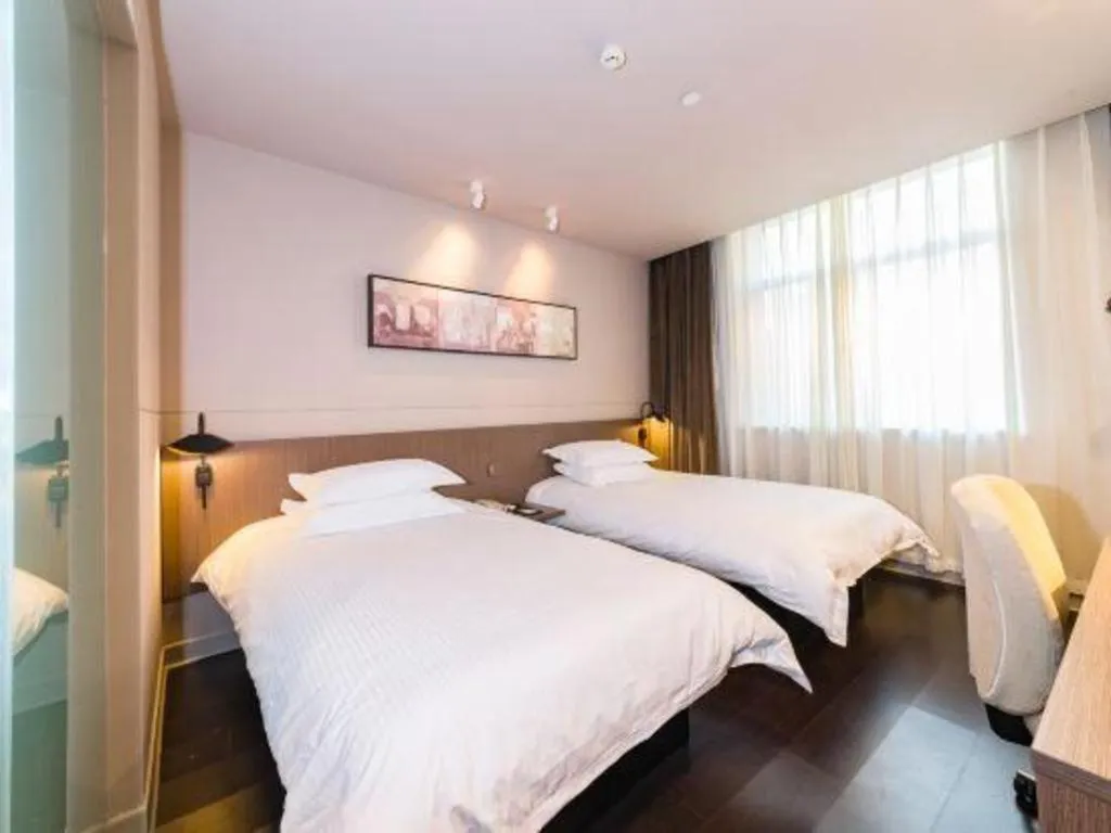 Bed in Jinjiang Inn Select Yancheng Oufeng Hua Street Julong Lake