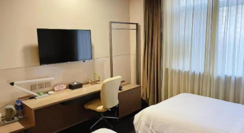 Bed in Jinjiang Inn Select Yancheng Oufeng Hua Street Julong Lake