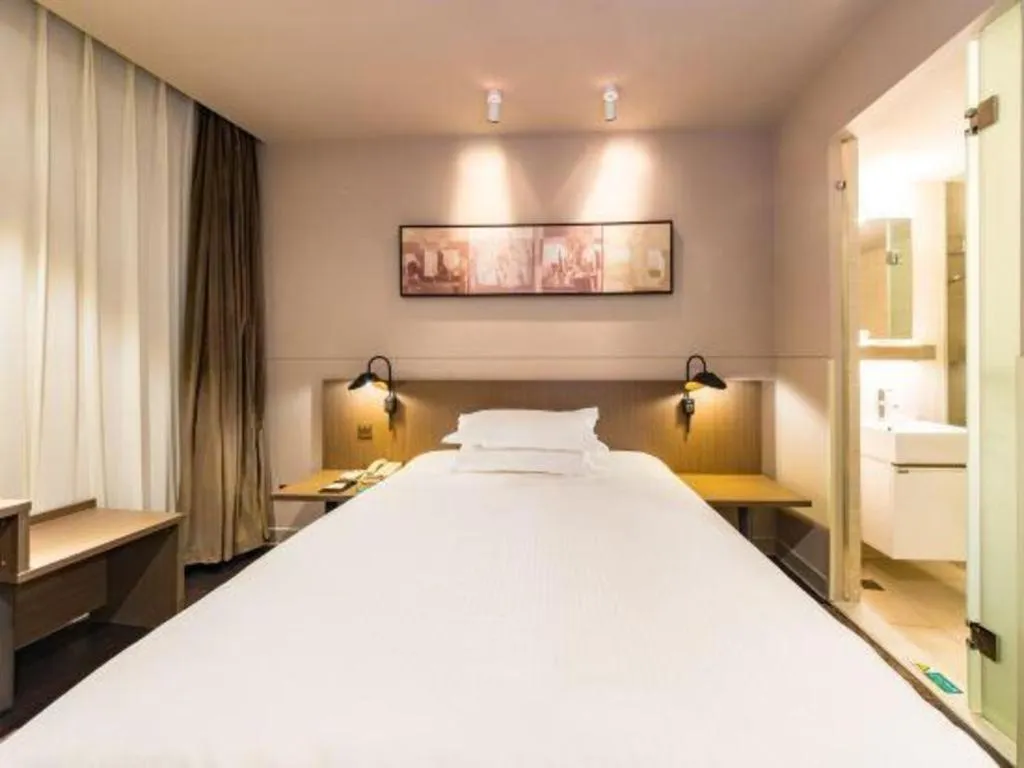 Bed in Jinjiang Inn Select Yancheng Oufeng Hua Street Julong Lake