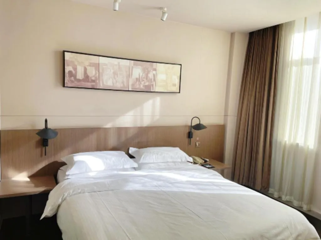 Bed in Jinjiang Inn Select Yancheng Oufeng Hua Street Julong Lake