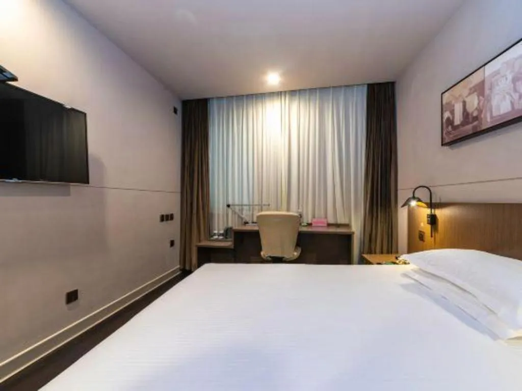 Bed in Jinjiang Inn Select Yancheng Oufeng Hua Street Julong Lake