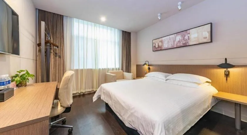 Bed in Jinjiang Inn Select Yancheng Oufeng Hua Street Julong Lake