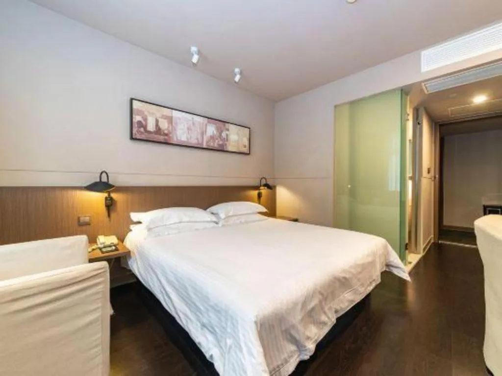 Bed in Jinjiang Inn Select Yancheng Oufeng Hua Street Julong Lake
