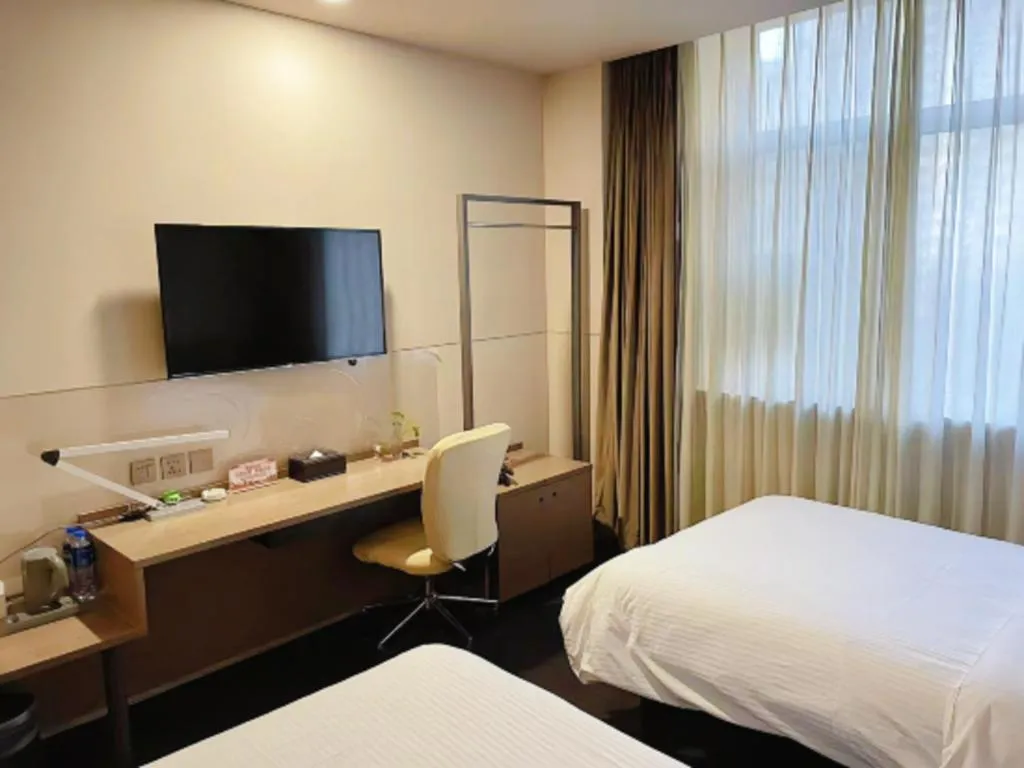 Bed in Jinjiang Inn Select Yancheng Oufeng Hua Street Julong Lake
