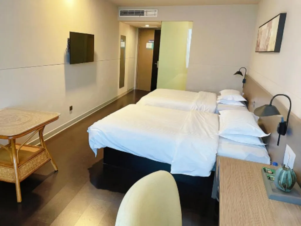 Bed in Jinjiang Inn Select Yancheng Oufeng Hua Street Julong Lake