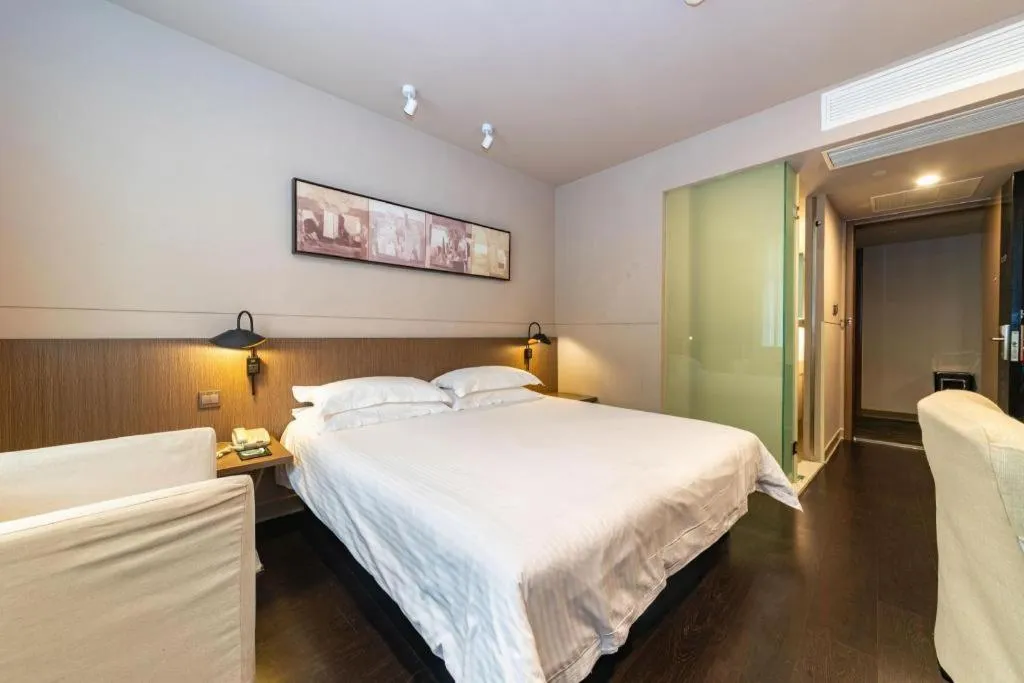 Bed in Jinjiang Inn Select Yancheng Oufeng Hua Street Julong Lake