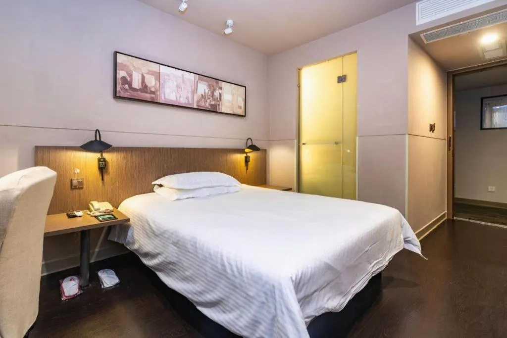 Bed in Jinjiang Inn Select Yancheng Oufeng Hua Street Julong Lake