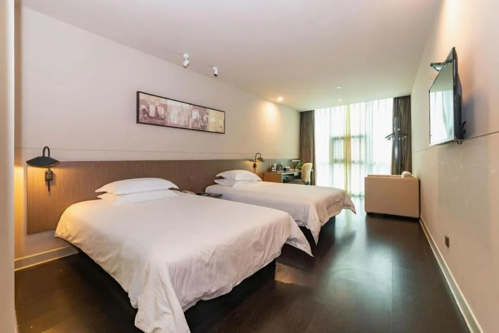 Bed in Jinjiang Inn Select Yancheng Oufeng Hua Street Julong Lake