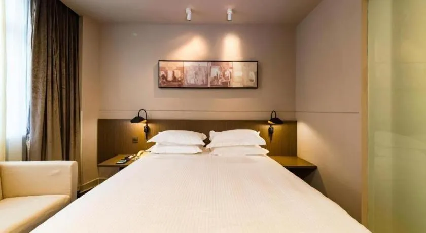 Bed in Jinjiang Inn Select Yancheng Oufeng Hua Street Julong Lake
