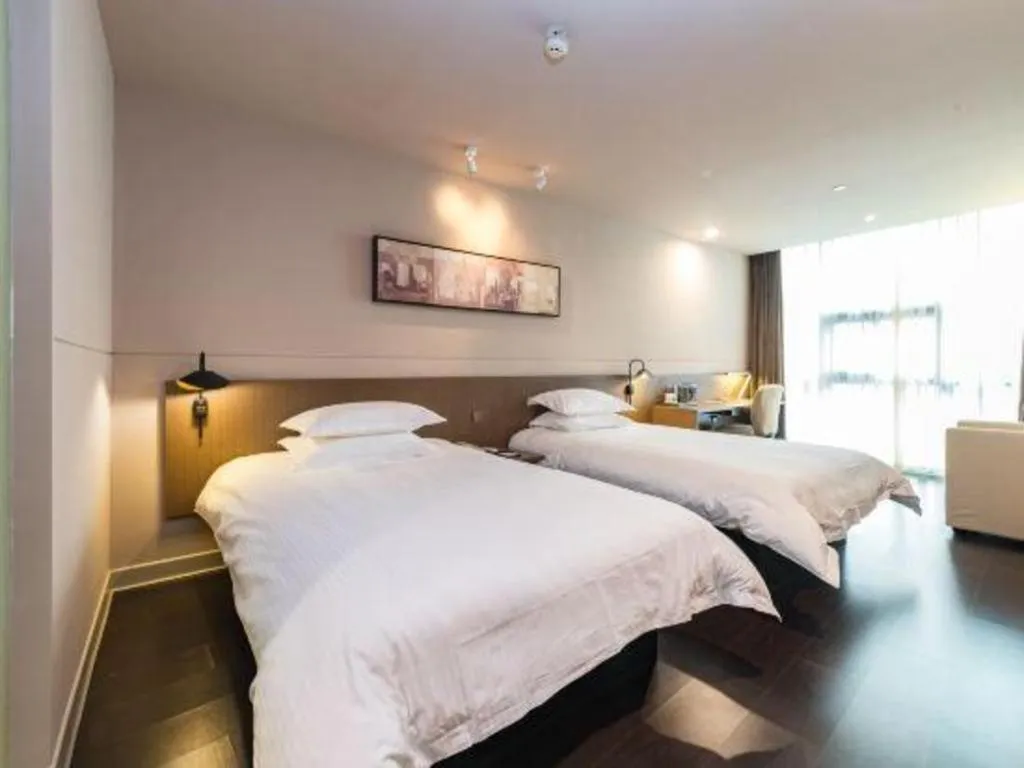 Bed in Jinjiang Inn Select Yancheng Oufeng Hua Street Julong Lake