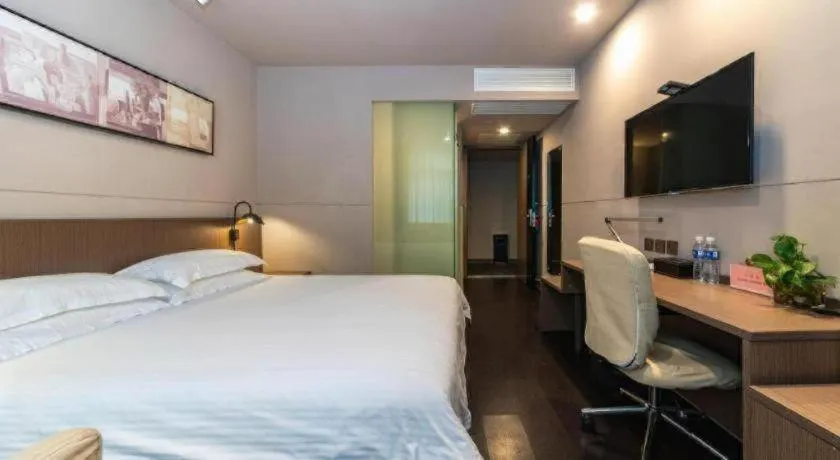 Bed in Jinjiang Inn Select Yancheng Oufeng Hua Street Julong Lake