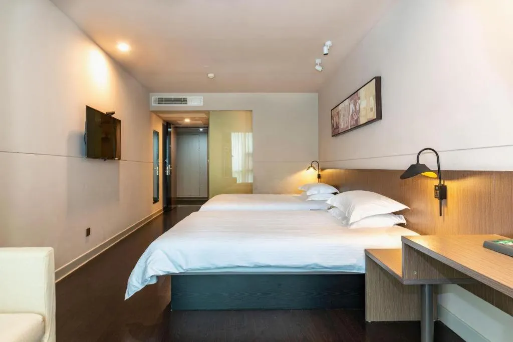 Bed in Jinjiang Inn Select Yancheng Oufeng Hua Street Julong Lake