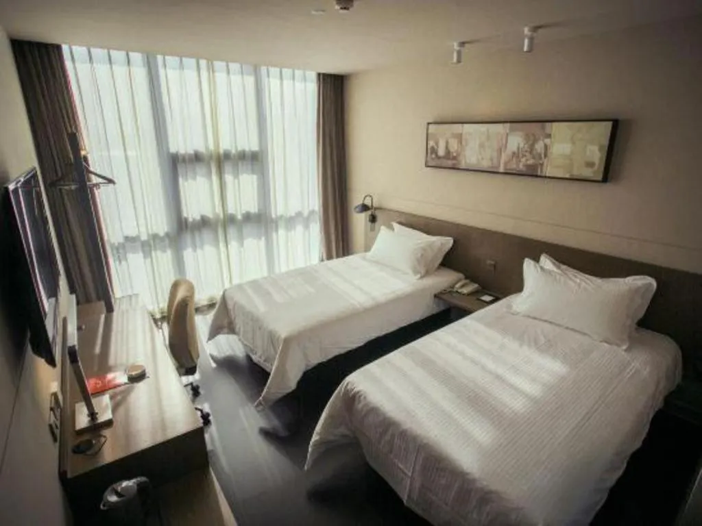 Bed in Jinjiang Inn Select Yancheng Oufeng Hua Street Julong Lake