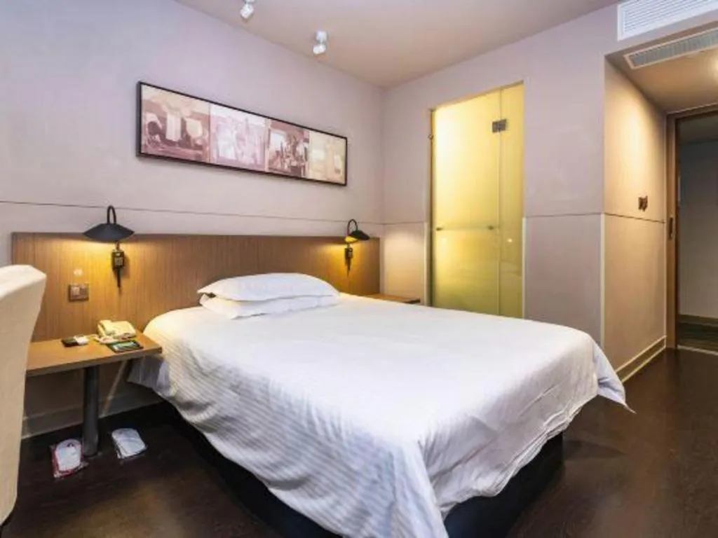 Bed in Jinjiang Inn Select Yancheng Oufeng Hua Street Julong Lake