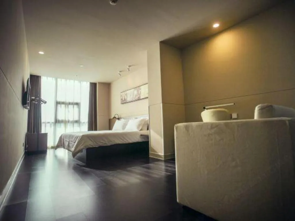 Bed in Jinjiang Inn Select Yancheng Oufeng Hua Street Julong Lake