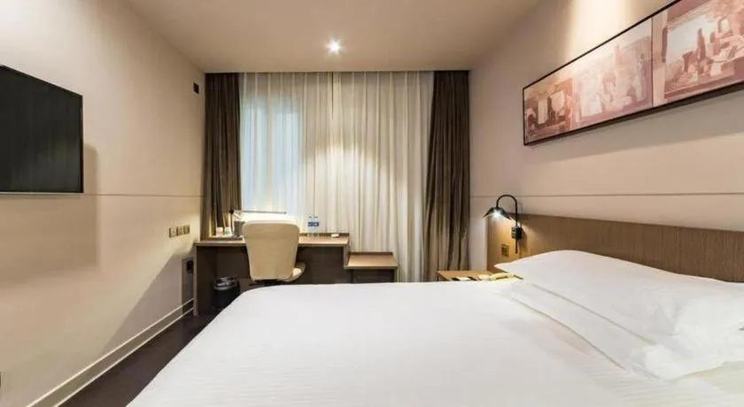 Bed in Jinjiang Inn Select Yancheng Oufeng Hua Street Julong Lake