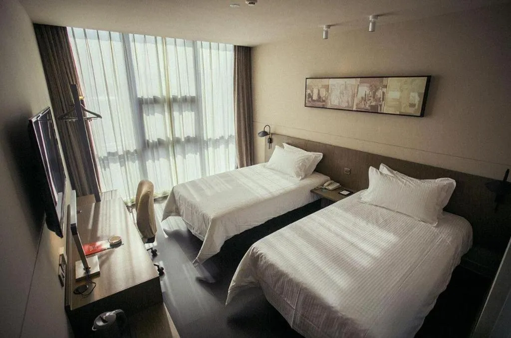 Bed in Jinjiang Inn Select Yancheng Oufeng Hua Street Julong Lake