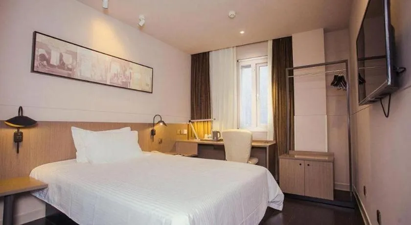 Bed in Jinjiang Inn Select Yancheng Oufeng Hua Street Julong Lake