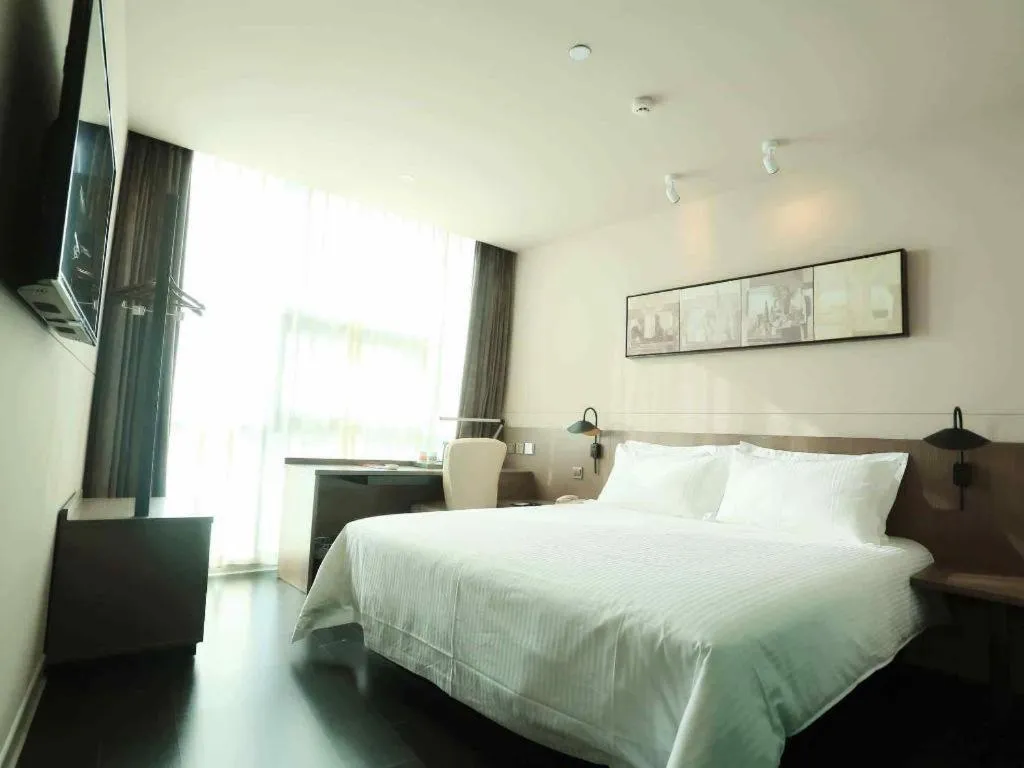 Bed in Jinjiang Inn Select Yancheng Oufeng Hua Street Julong Lake