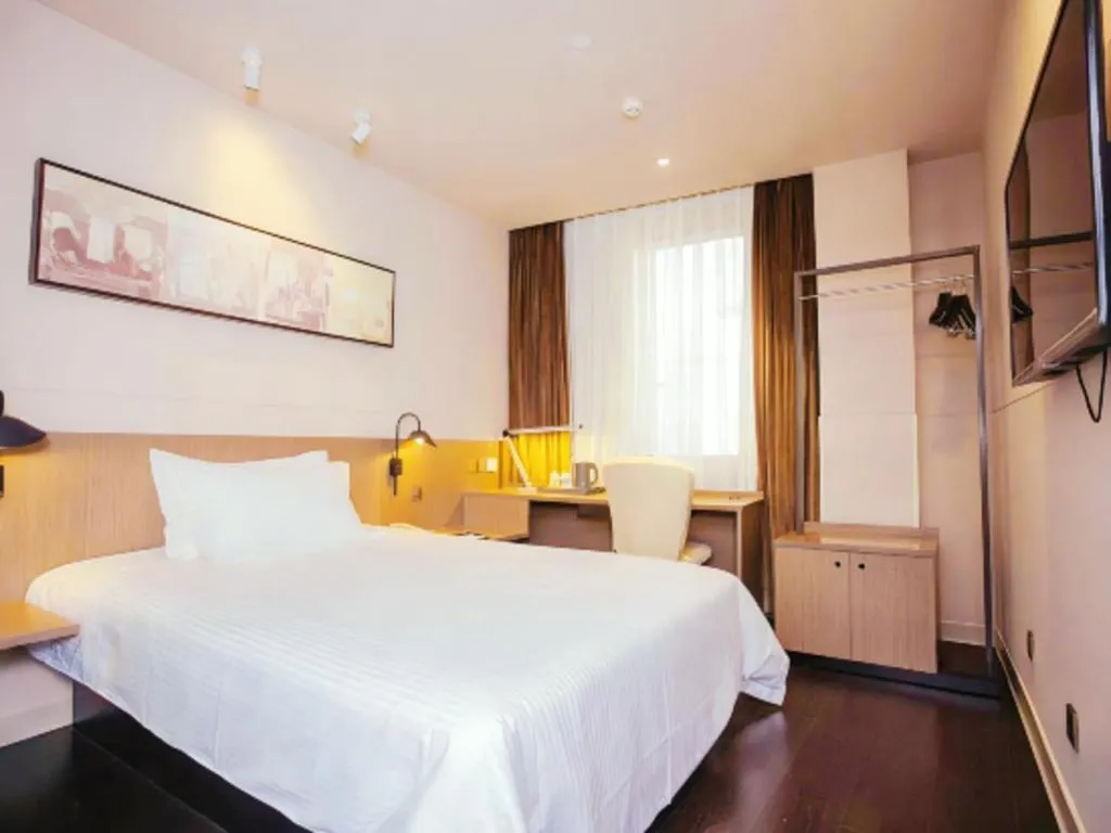 Bed in Jinjiang Inn Select Yancheng Oufeng Hua Street Julong Lake