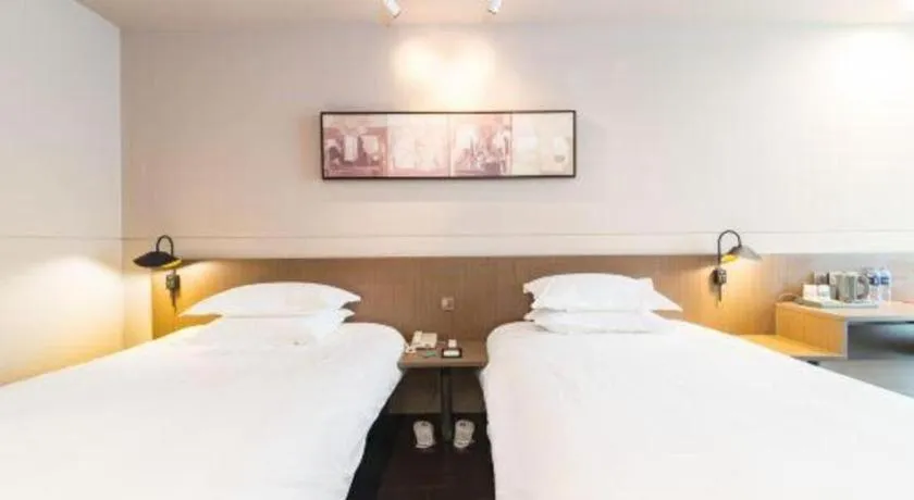 Bed in Jinjiang Inn Select Yancheng Oufeng Hua Street Julong Lake