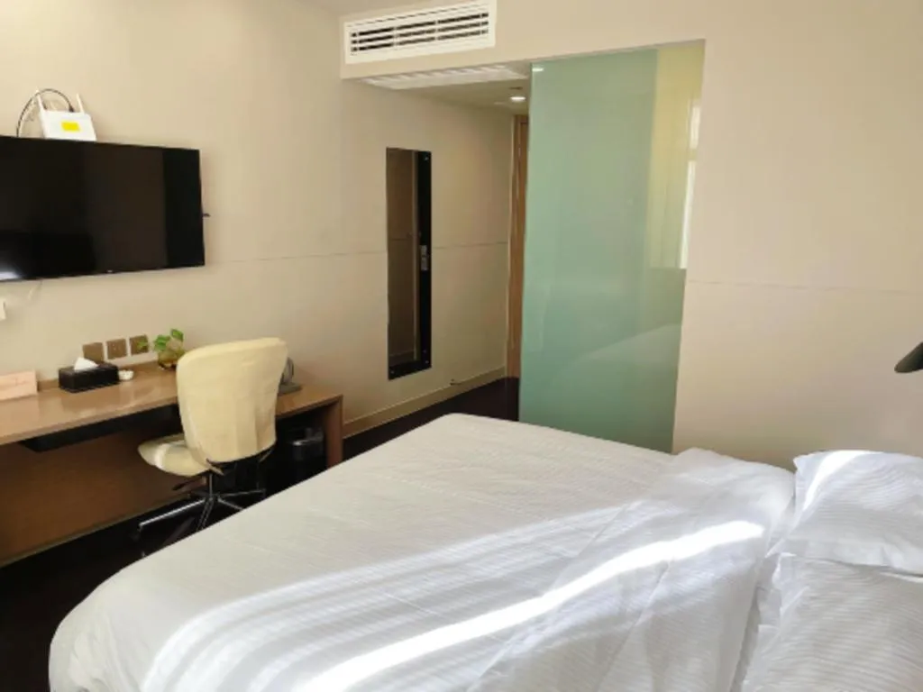 Bed in Jinjiang Inn Select Yancheng Oufeng Hua Street Julong Lake